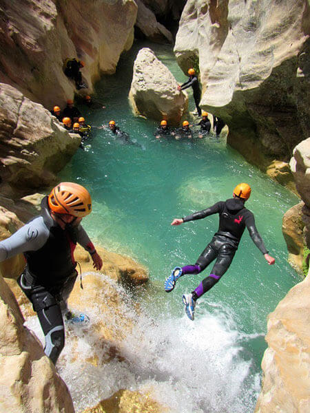 Canyoning also involves jumping into the water under professional instruction.