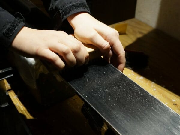 removing the wax after waxing the skis