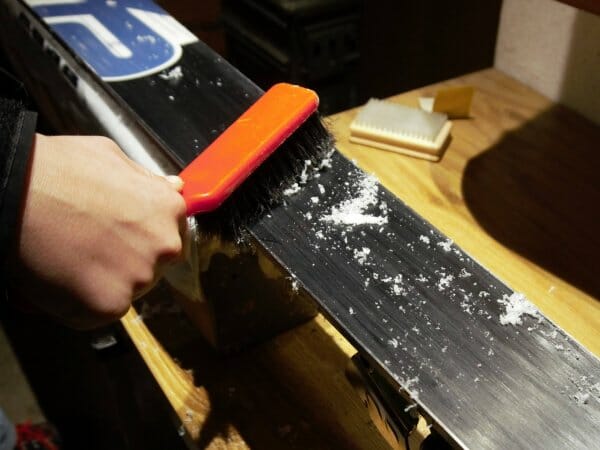 removing the wax after waxing the skis