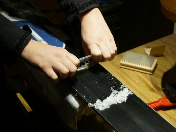 removing the wax after waxing the skis