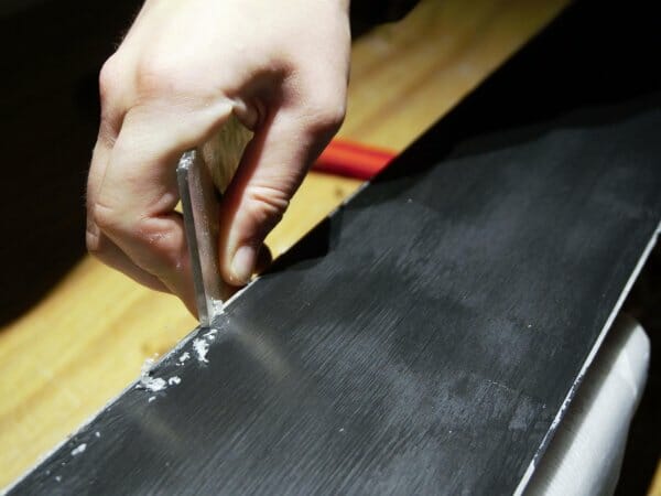 removing the wax after waxing the skis