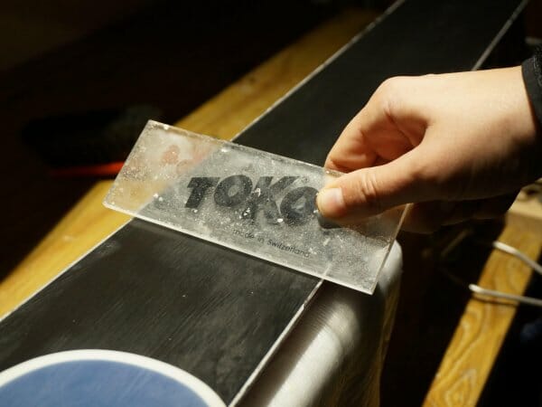 removing the wax after waxing the skis